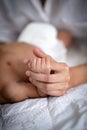 Asian parent hands holding newborn baby fingers, Close up mother`s hand holding their new born baby. Love family healthcare and Royalty Free Stock Photo