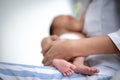 Asian parent hands holding newborn baby fingers, Close up mother`s hand holding their new born baby. Love family healthcare and Royalty Free Stock Photo