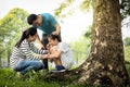 Asian parents give advice,talking sharing thoughts care,support to teenage girl,loving mother and father speak have comforting and