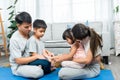 Asian parents, son daughter, lovely family, four of them doing activities together, with meditation, three them Royalty Free Stock Photo