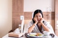 Asian patient women feeling unhappy and bored meal,Loss of appetite,Bored with food Royalty Free Stock Photo