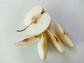 Asian pear Pyrus Pyrifolia with slices isolated on white background closeup.