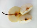 Asian pear Pyrus Pyrifolia with slices isolated on white background closeup.