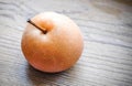 Asian pear on the wooden background Royalty Free Stock Photo