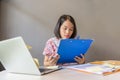 Office woman reading report documents in the office Royalty Free Stock Photo