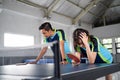 Asian ping pong doubles players get frustrated when they lose Royalty Free Stock Photo