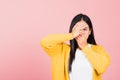 Woman in depressed bad mood covering face with hands Royalty Free Stock Photo