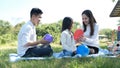 Asian portrait family trip father mother and daughter enjoy relaxation playing balloons with family to lifestyle freedom family Royalty Free Stock Photo