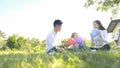 Asian portrait family trip father mother and daughter enjoy relaxation playing balloons with family to lifestyle freedom family Royalty Free Stock Photo