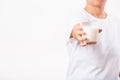 Woman use hands hold drink white milk from a glass Royalty Free Stock Photo