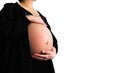 Asian Pregnant woman wearing black dress and holds hands on swollen belly isolated on white background and copy space Royalty Free Stock Photo