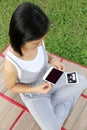 Asian Pregnant women show ultrasound film baby picture on her be