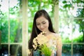 Asian pretty girl has relaxing with happy and smiling at Little Royalty Free Stock Photo