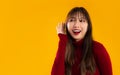 Asian pretty woman long hair in red long sleeve t-shirt posing gossip and listening Royalty Free Stock Photo