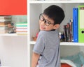 Asian primary school student looking at camera smiling while stu Royalty Free Stock Photo