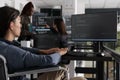 Asian programmer with physical disability typing html code on computer Royalty Free Stock Photo