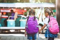 Asian pupil kids with backpack holding hand and going to school Royalty Free Stock Photo