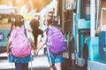 Asian pupil kids with backpack holding hand and going to school Royalty Free Stock Photo