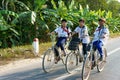 Asian pupil ride bicycle