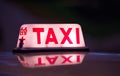 Asian red taxi sign