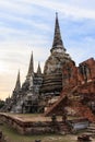 Asian religious architecture. Ancient Buddhist pagoda ruins at Wat Phra Sri Sanphet Temple in Ayutthaya, Thailand Royalty Free Stock Photo