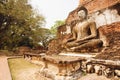 Asian religious art landmark - Brick temple walls with body of Buddha