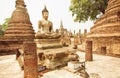 Asian religious art landmark - Brick temple Wat Maha That with Buddha statue