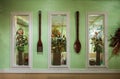 Asian restaurant interior with windows and walls and green plants. Asian style restaurant interior