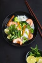 Asian rice noodle, shrimps and vegetable soup in bowl Royalty Free Stock Photo