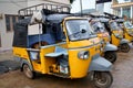 Asian rickshaws/tempos/ tuktuks in row Royalty Free Stock Photo