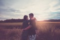 Asian,Romantic couple or Homosexuality, female love hug on the rice field with sunset, Valentine`s Day