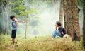 Asian Rural children girl talking communicate with can phone.The joy of communication among childrens in rural Asia Royalty Free Stock Photo