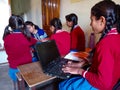 Asian school girl holded laptop computer at class room in India January 2020