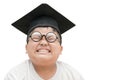 Asian school kid graduate bored with graduation cap isolated Royalty Free Stock Photo