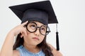 Asian school kid graduate thinking Royalty Free Stock Photo