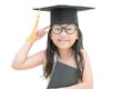 Asian school kid graduate thinking and smile with graduation cap Royalty Free Stock Photo