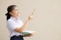 Asian school uniform teen girl hand show present bring image idea imagine concept happy smile