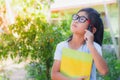 Asian schoolgirl holding books and pencils Royalty Free Stock Photo