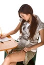 Asian schoolgirl is preparing to cheat on test Royalty Free Stock Photo