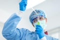 Asian scientists wear protective clothing while doing medical research in a science lab Royalty Free Stock Photo