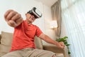 Asian Senior chinese man is using VR glasses