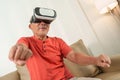 Asian Senior chinese man is using VR glasses