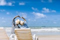 Asian senior couple or elderly people walking and siting at the beach