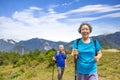 Asian Senior  couple hiking on the beautiful mountains Royalty Free Stock Photo