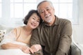 Asian senior couple smiling at the camera. Family mature couple portrait.