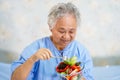 Asian senior or elderly old lady woman patient eating breakfast healthy food Royalty Free Stock Photo