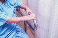 Asian senior or elderly old lady woman patient use toilet bathroom handle security in nursing hospital ward Royalty Free Stock Photo