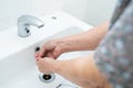 Asian senior elderly old lady woman patient washing hands in toilet bathroom the hospital ward, healthy medical. Royalty Free Stock Photo