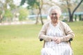 Asian senior or elderly old lady woman patient on wheelchair in park Royalty Free Stock Photo