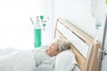 Senior female patient sleeping on bed in hospital Royalty Free Stock Photo